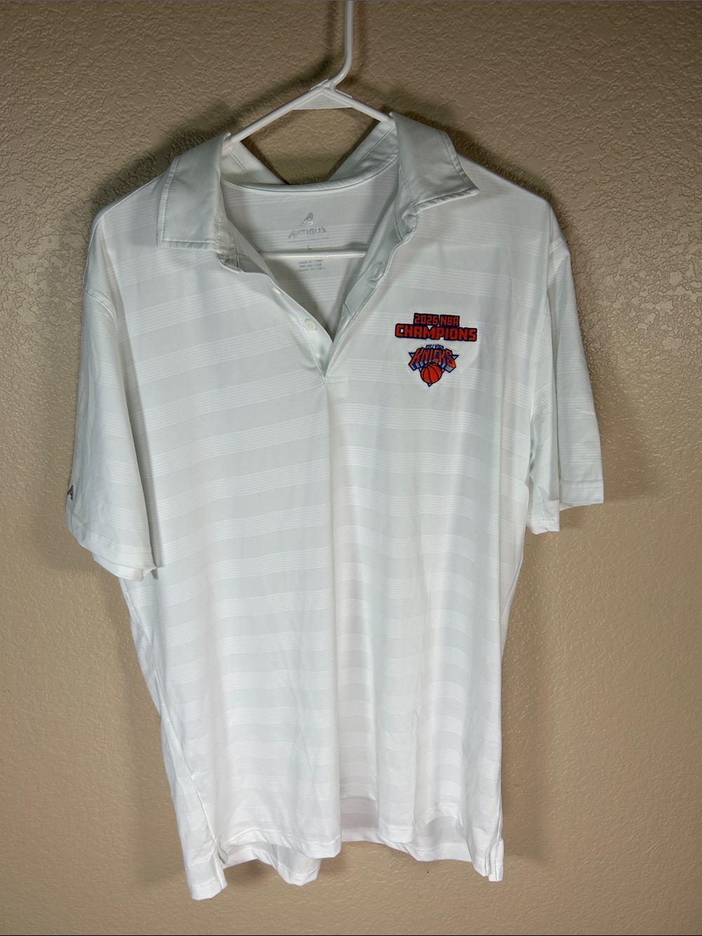 Antigua White Polo with Knicks Champions Patch